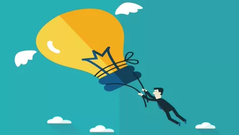 Man riding lightbulb